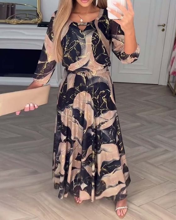 Elegancka szyfonowa sukienka z nadrukiem na trzy czwarte rękawa
