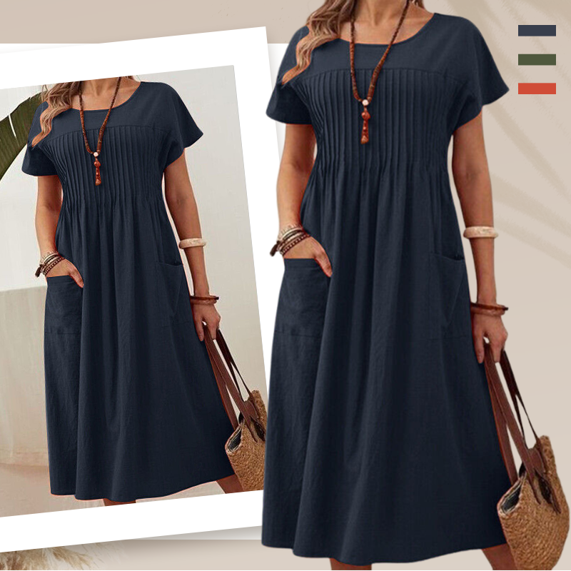 Damska sukienka plisowana z krótkim rękawem i kieszeniami